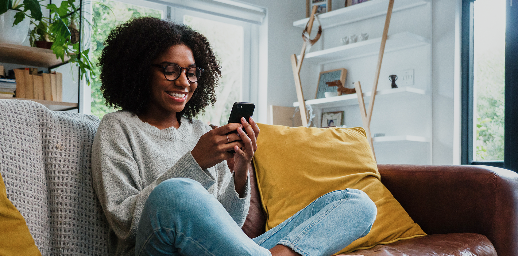 Borrower checking a mortgage app on a phone